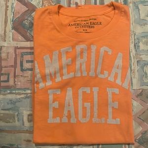 A medium orange American eagle t-shirt fair condition